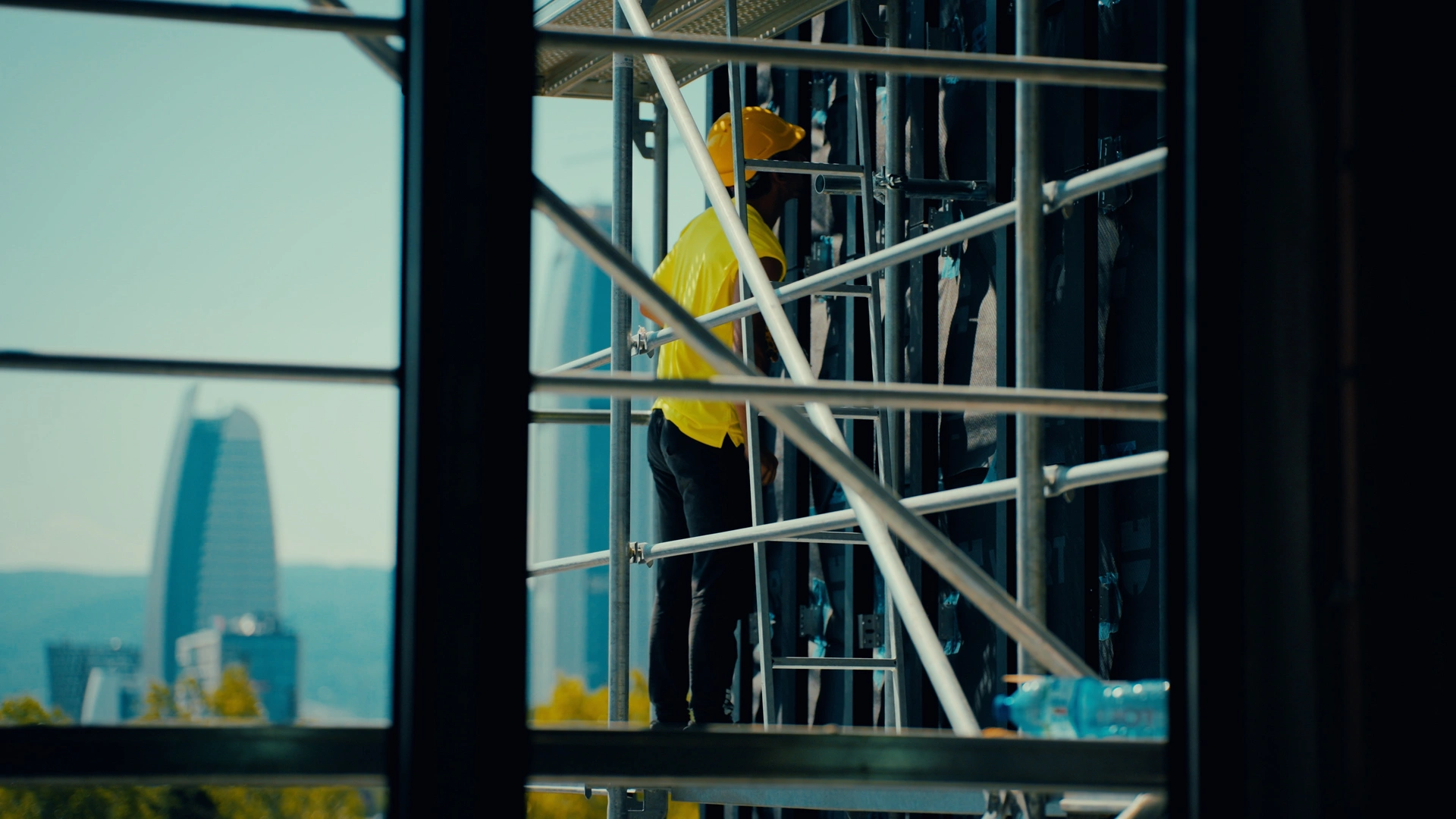 Facade installation work from scaffolding